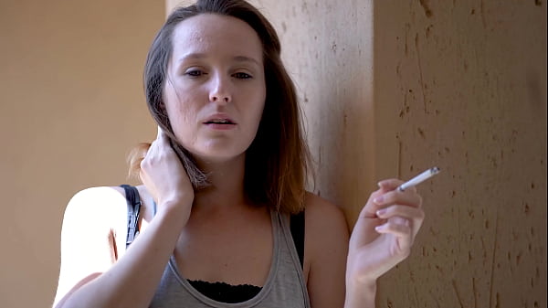 Brunette Smoking Tease with Intense Eye Contact